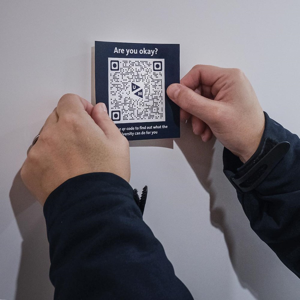 Student wellbeing campaign: QR codes on toilets and info via social media