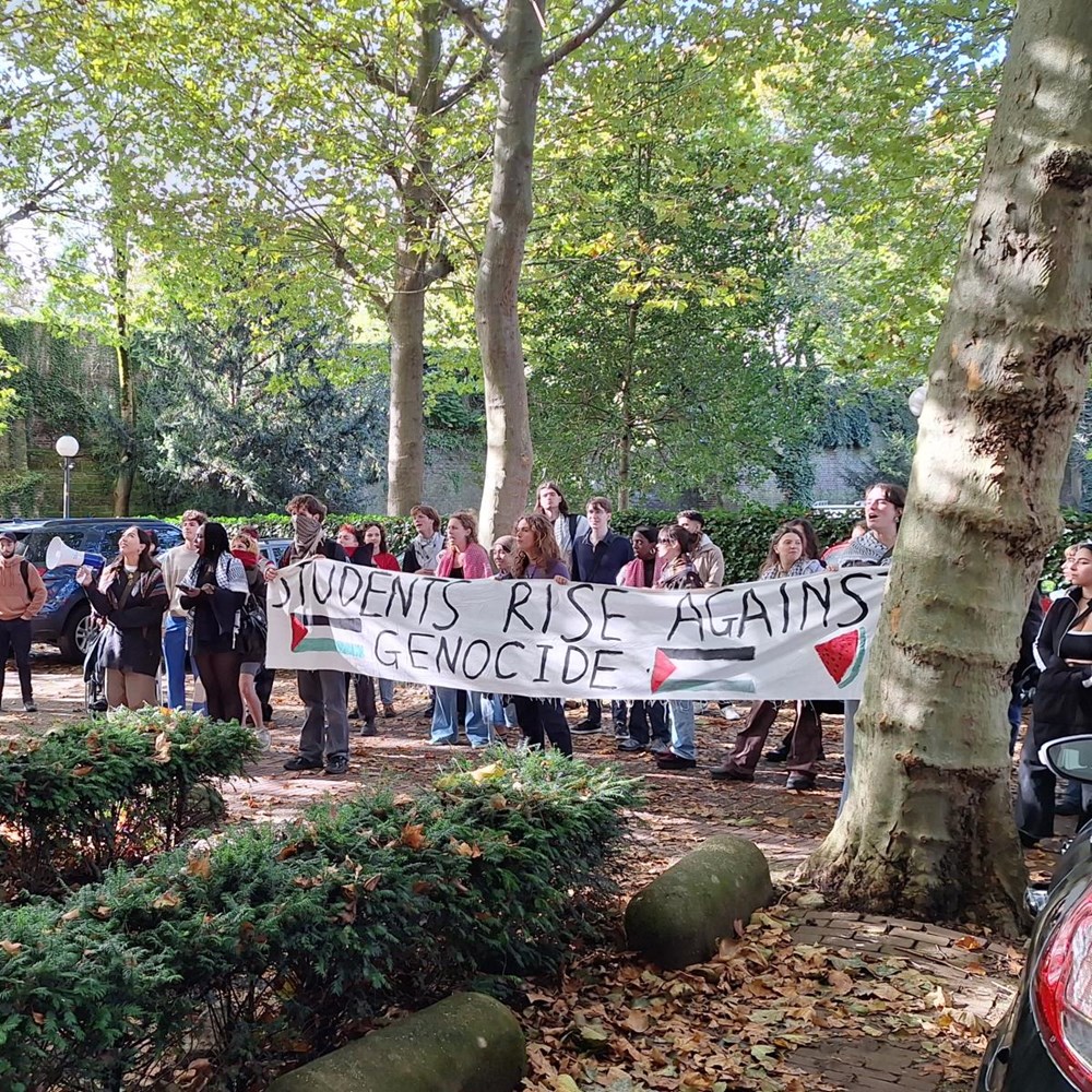 Pro-Palestinian protesters march past UM buildings in city centre