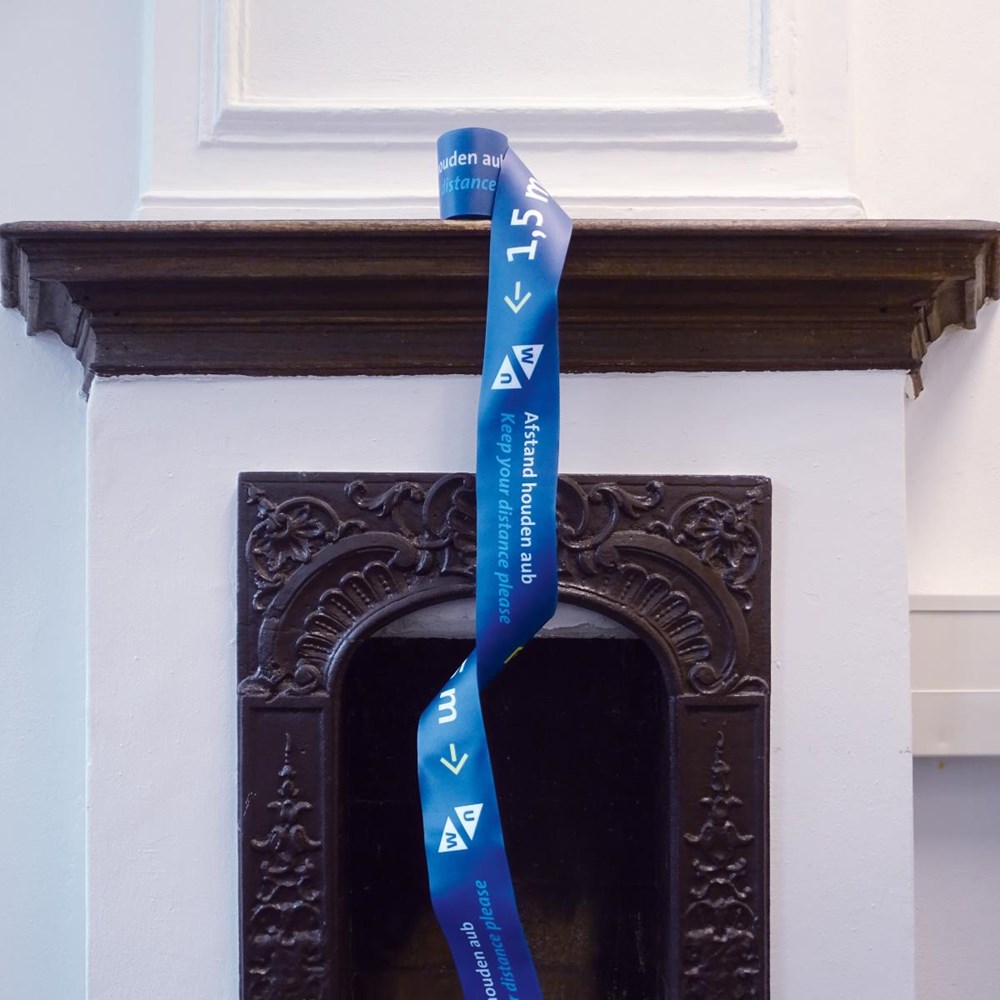 Social distancing barrier tape