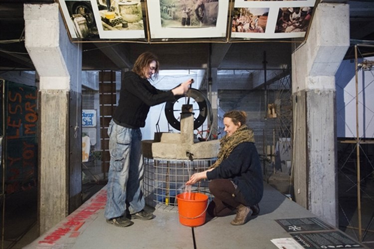 Moerenhout and Smolka work the Demotech water pump