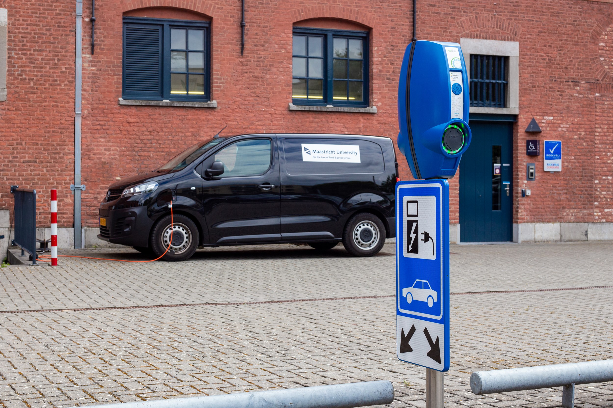 Electric delivery vans and dozens of charging stations